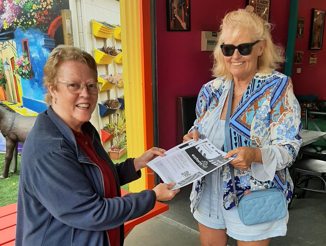 Membership draw winner Amanda receiving her prize at the Latin Shack, Samford Valley